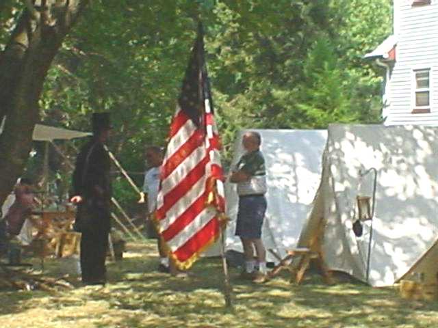 President Abraham Lincoln speaks with a soldier during the reenactment at Buckelew Day.