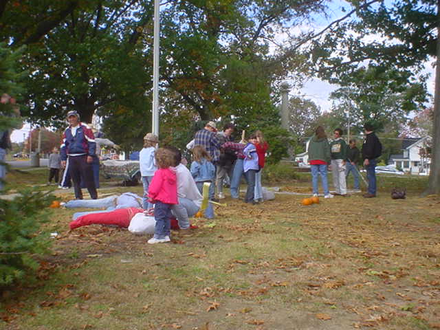 Making scarecrows in Veterans' Memorial Park
