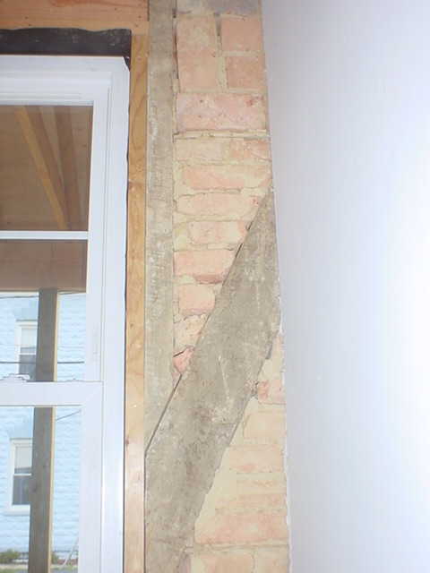 Brick lining in the walls of the house for insulation.