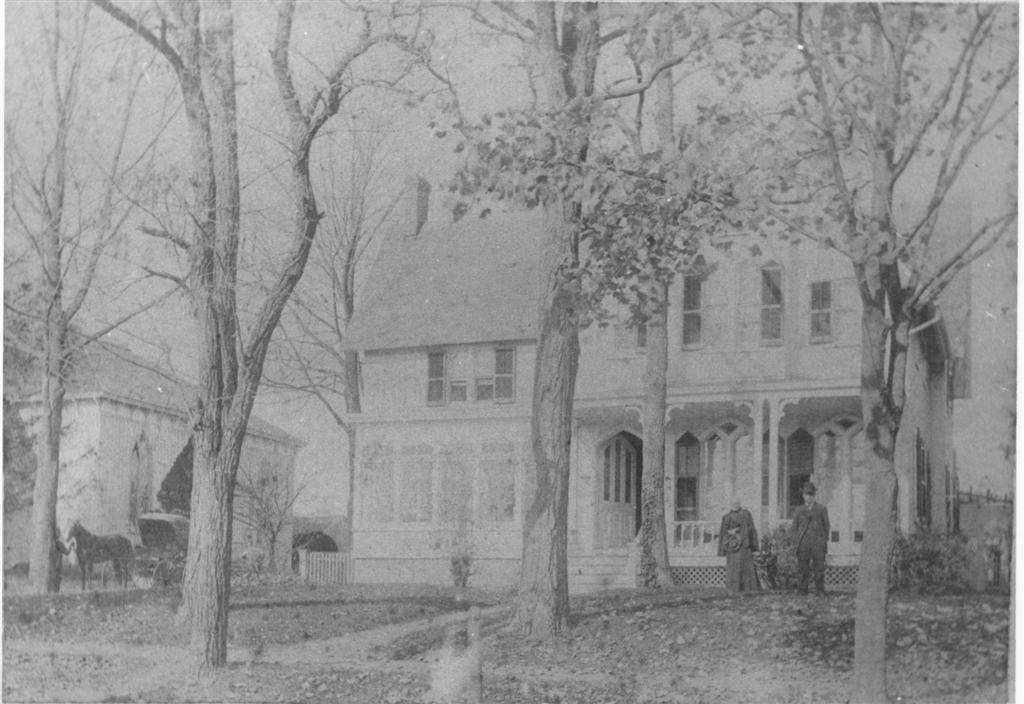 1890 View of the Manse with Dr. and Mrs. B. S. Everitt.