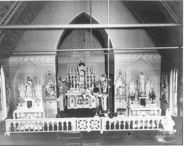 The interior of the original St. James Roman Catholic Church, constructed in 1879 on land donated by Mrs. James Buckelew.   The building was demolished in 1958 to make way for a new church building.