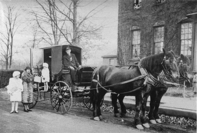 The Lincoln Coach in front of Jamesburg School No. 1 with the Hoffmann Family in 1936.
