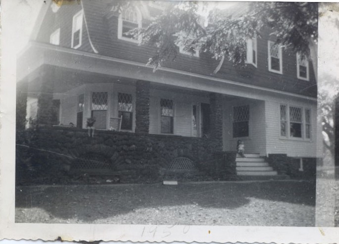 The Stoeffler House, circa 1910, photographed in 1952, that was located on the corner of Forsgate Drive and Perrineville Road.  Currently, CVS occupies the house. Trish Stoeffler O'Hagan is sitting on the wall of the porch and her sister Margaret Stoeffler is on the steps to the right.