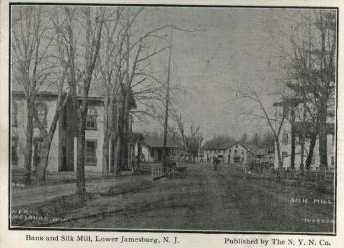Looking Down Buckelew Avenue towards First National Bank (left) and Silk Mill (right).