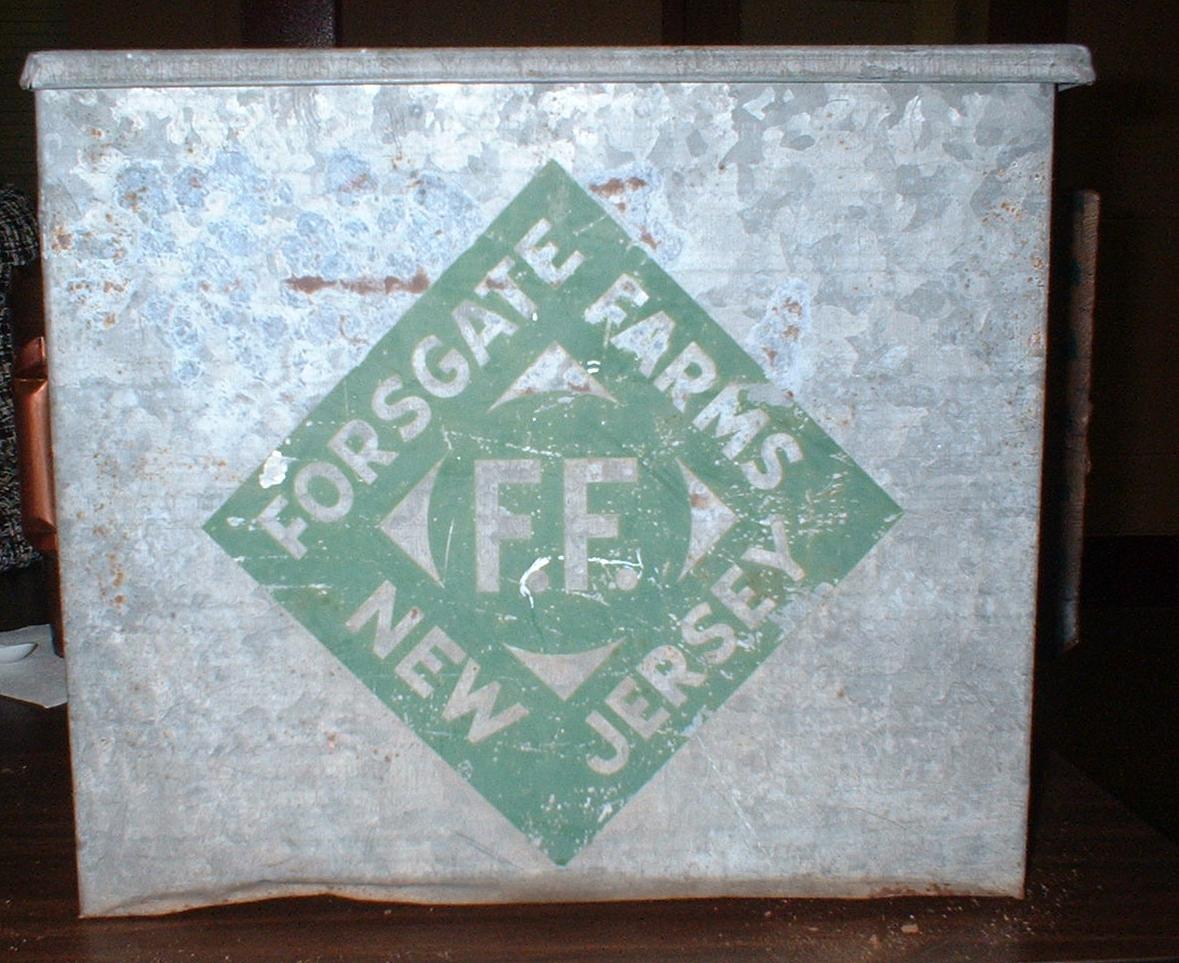 A Metal Forsgate Farms Milk Box